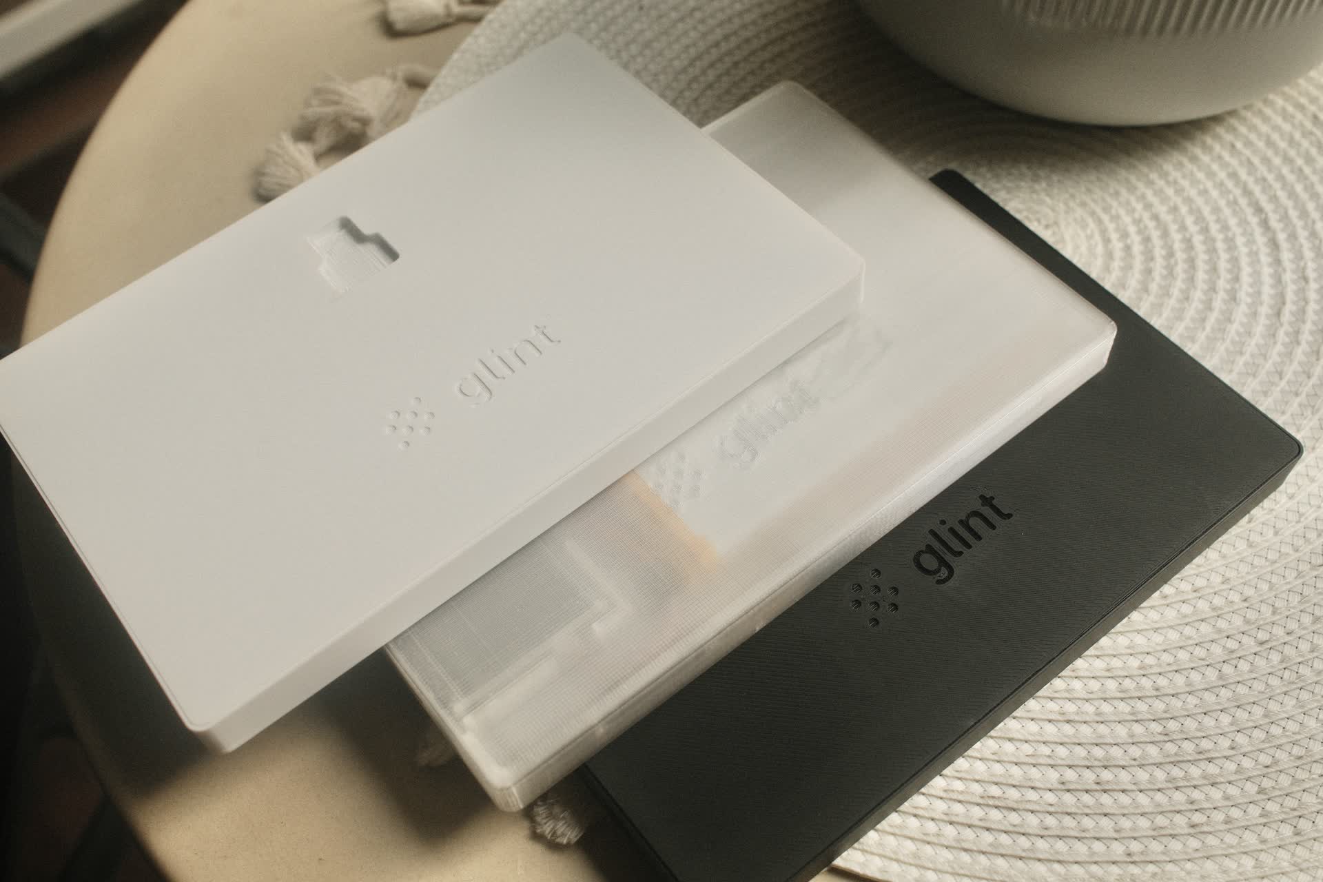 Choose from clean black, white, and translucent finishes to match your space.